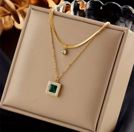 Emerald Zircon Studded Pendants Along with Golden Chains