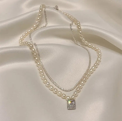 Elegant Silver Stone Pendant With Pearls